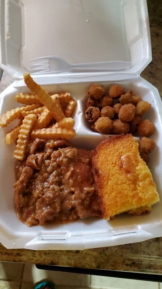 Smothered Pork Chops with Fries and Okra the Pork Chops Were Really Tender